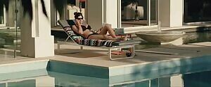 Alexandra Daddario by the pool