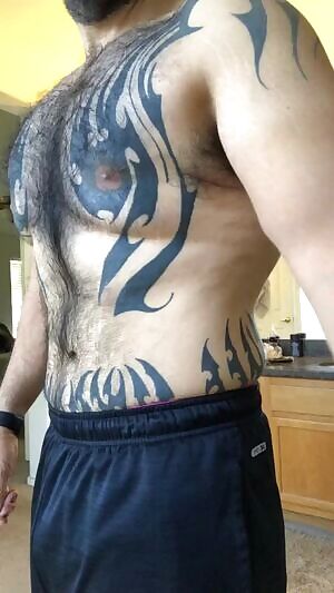A headless hairy inked dad