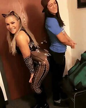 Nattie rubbing booties with Bayley making the imagination run wild