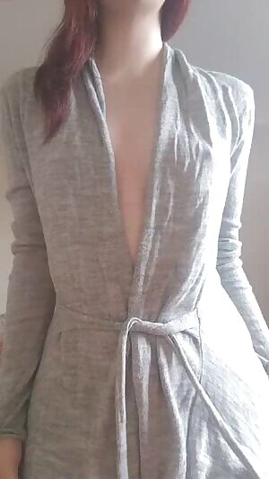 Redhead loosing her robe