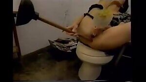 DP with toilet brush and plunger