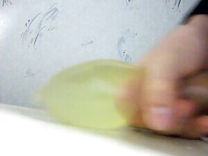 proof cumming in a condom filled with piss
