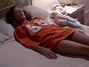 A spirit tries to get in JoBeth Williams in Poltergeist