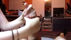 Two handed hand job till eruption