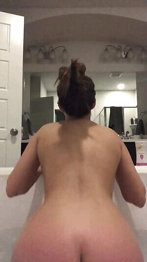 Outta the bath and on her strap on? I wish.