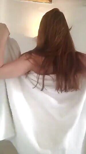 What she's doing when you're waiting for her to get dressed