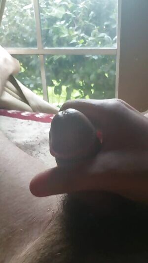 Touching my small dick with my curtains slightly open 😈