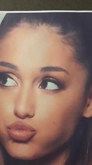 Ariana Grande gets a load on the face while holding another in her mouth