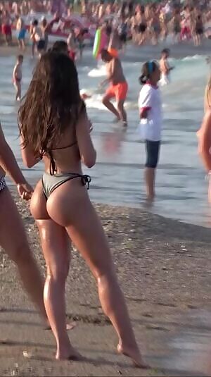 Caught filming on the beach