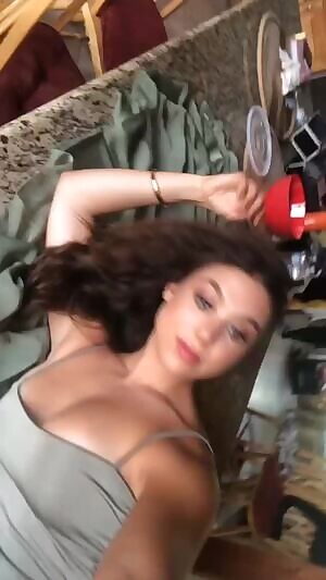 Kira Kosarin rolling in bed