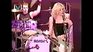 NSFW_GIF - Courtney Love showing her tits to thousands of fans during a concert