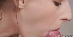 Caressing his cock with her lips