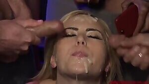 Naughty Cumslut Enjoying a Bukkake