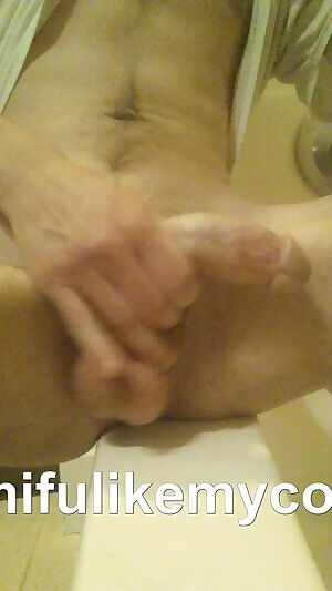 Here's a gif of me stroking my cock and playing with my big balls.