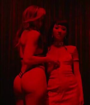 Jennifer Lopez undressing Constance Wu in 'Hustlers'