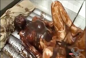 Japanese woman drizzled with chocolate during sex