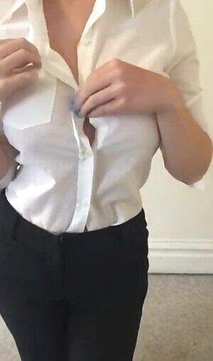 Slowly revealing her tremendous tits