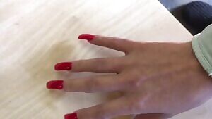 Checking out her red claws