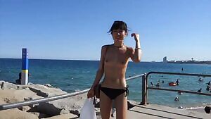 Naked at a busy beach