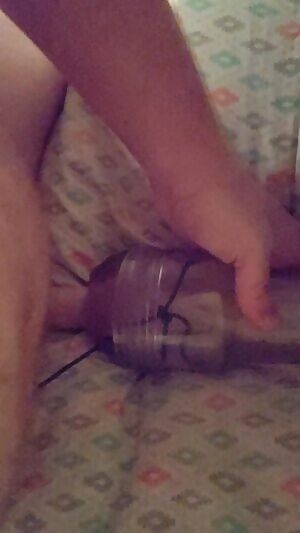 A little difficult to pull off with one hand...but I used a cinch knot to add variable tightness to my hardcased fleshlight...