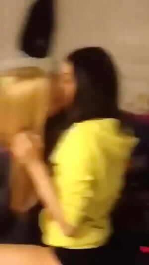 Friends taking turns kissing