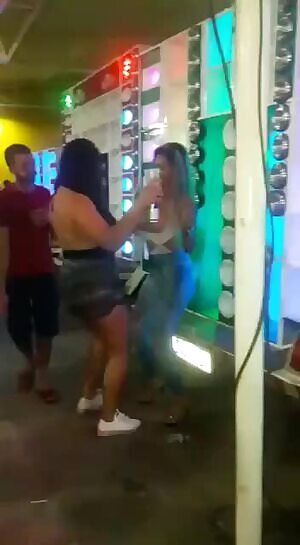 She flashes tits in club, her friend takes off.