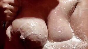 Big Soapy natural pierced titties due for a cleaning!