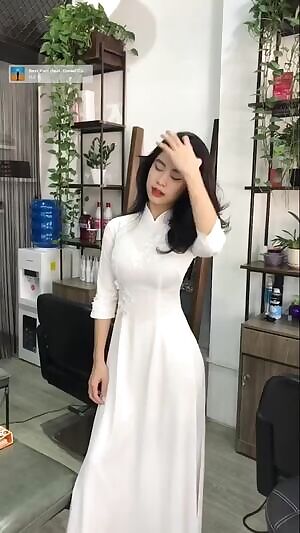 Trying out her new dress