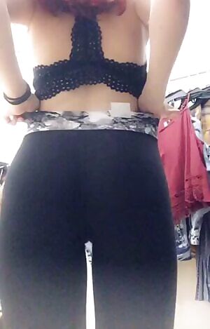 Stripping out of yoga pants in the fitting room