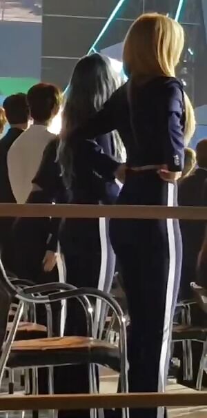 Twice - sideview in tight pants