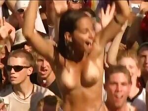 Cute girl showing off her boobs at Woodstock 99