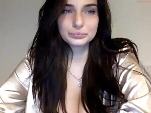 Doing a reveal of her huge natural tits