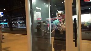 Peeing in the station phone booth