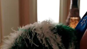 Jennifer Love Hewitt dressed as a cheerleader