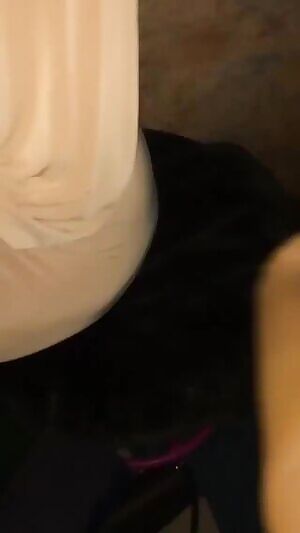 Squeezing her cheeks