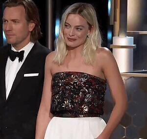 Margot Robbie on stage, realizing she mistakenly put on the vibrating panties after you turn it on...