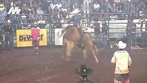 Bull rider takes a hoof to the chest