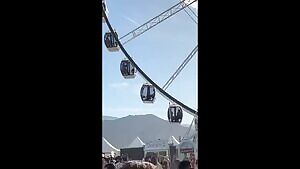 Risky public blowjob on a ferris wheel