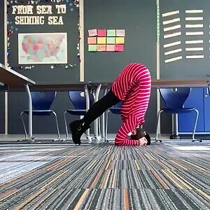 MILF teacher doing Yoga in her classroom