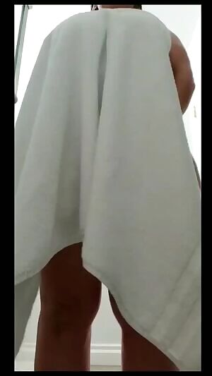 Packing heat behind that towel.......