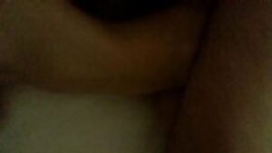 Covering her mouth so her roommate doesn't hear while she's taking my dick