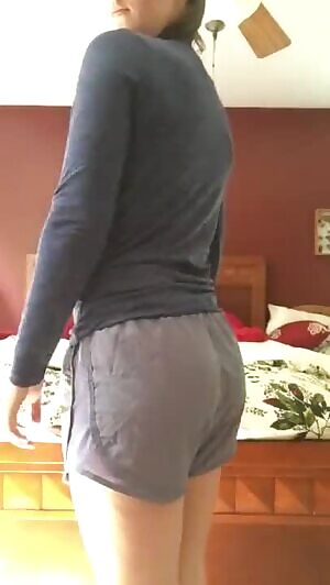 Showing off her pink thong