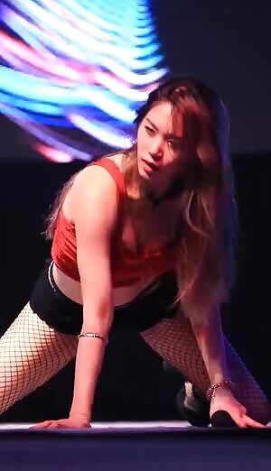 Switch's Gayoung Hot in Fishnets and short shorts.