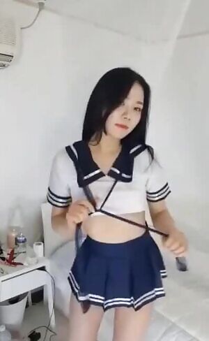 Schoolgirl with Baby Oil