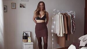 Getting dressed in tights and a skirt