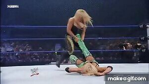 Nattie dominating Kelly and making her submit