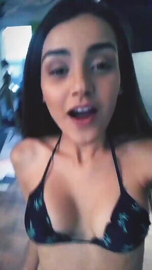 She's back, she's got her tits out, and she's taking photos for you.