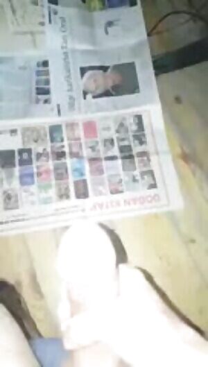 Cumshot on a newspaper