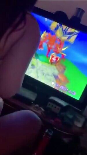 White girl trying to play crash bandicoot with bbc in her guts