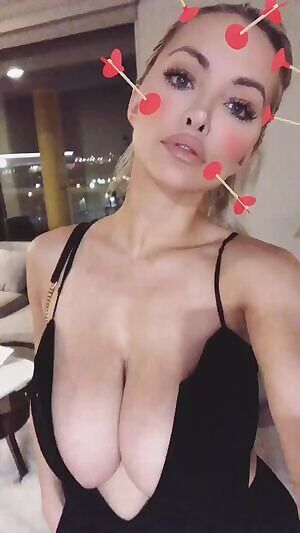 You don't even need Lindsey Pelas to take her top off to stick your hard cock between her tits and fuck them